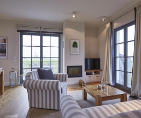 Reetland am Meer Premium Reetdachvilla mit 2 Schlafzimmern, Sauna und Kamin