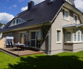 Ferienhaus "Regenbogen" F401 mit Kamin, Terrasse, Garten